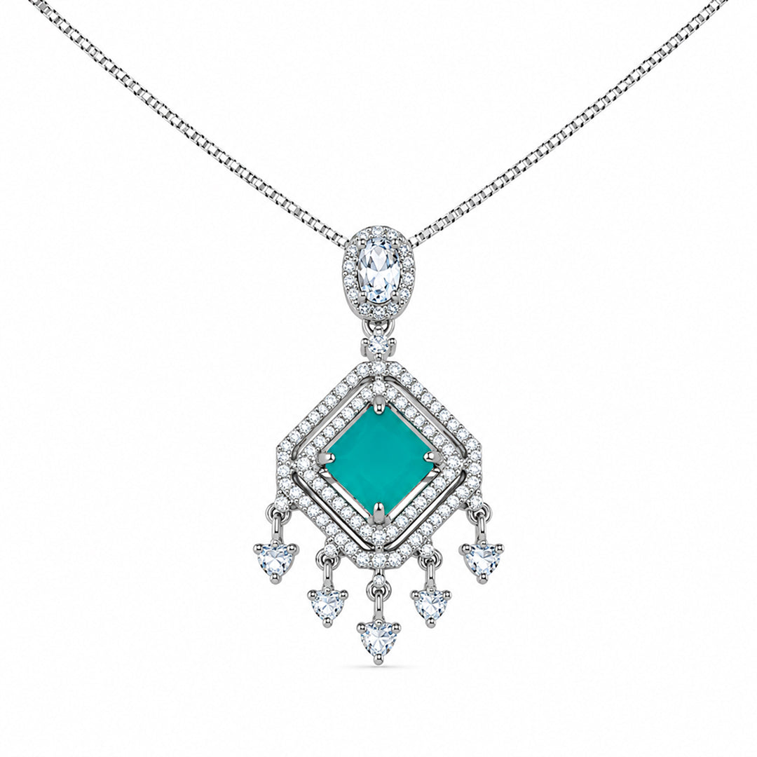 Silver-tone geometric pendant necklace with emerald green crystal center and sparkling crystal accents for women.