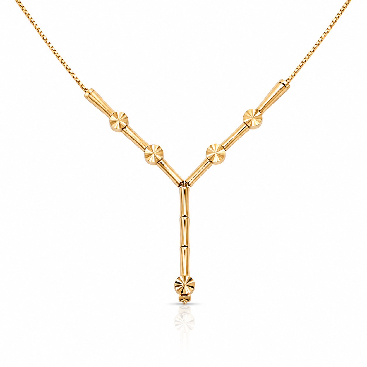 Gold geometric Y-drop necklace featuring polished cylindrical bars and textured circular accents on a delicate gold box chain.