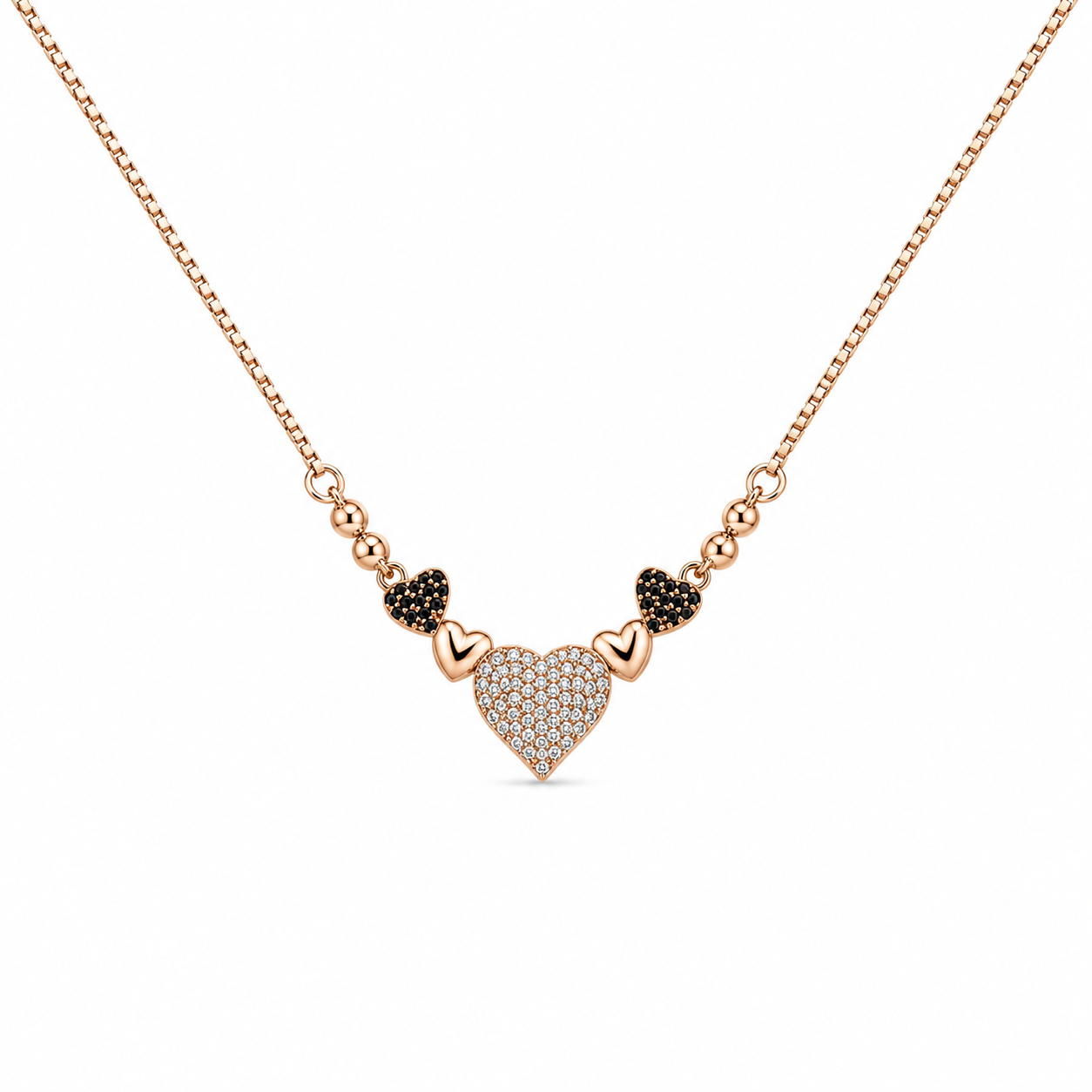 Rose gold double heart necklace featuring sparkling clear crystals with elegant black crystal heart accents on a delicate box chain.