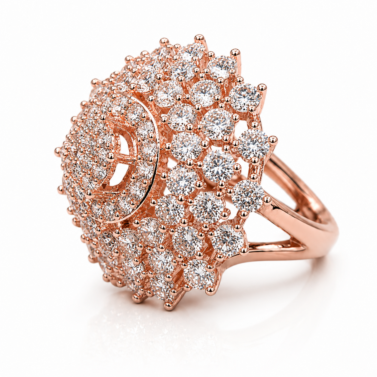 Rose gold-tone dome statement ring featuring multiple layers of sparkling round zircon crystals in an intricate clustered design.