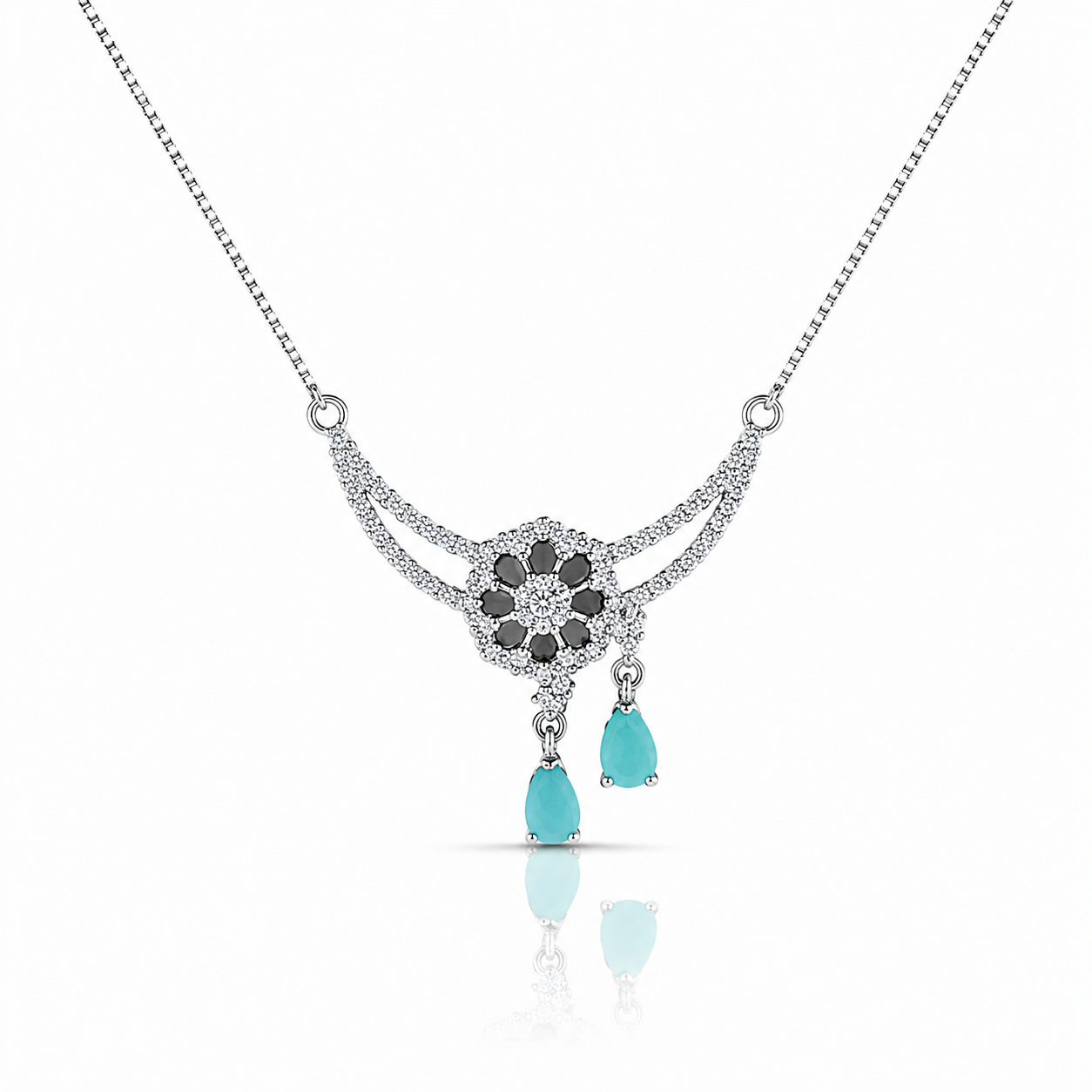 Silver necklace featuring a sparkling floral centerpiece with curved crystal detailing and two elegant aqua teardrop crystal drops.