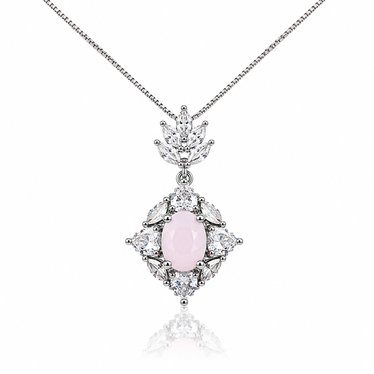 Silver pendant necklace featuring a blush pink oval crystal surrounded by marquise-cut zircon stones with a sparkling leaf-inspired bail.