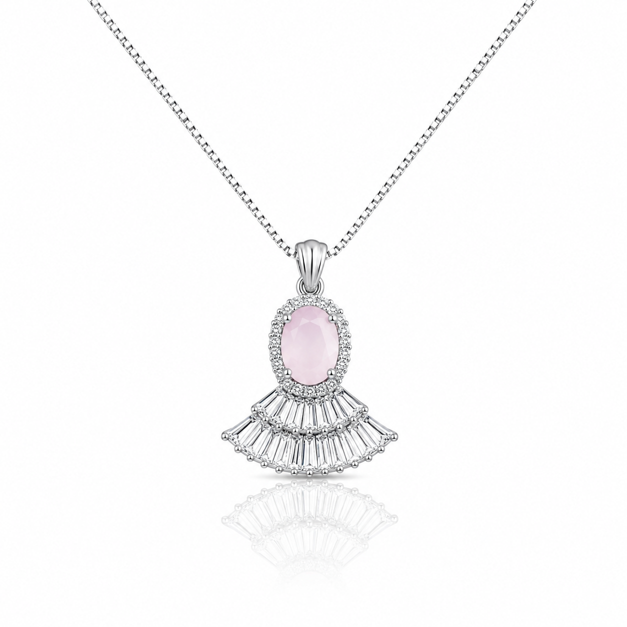 Silver pendant necklace featuring a blush pink oval crystal with sparkling fan-shaped baguette zircon detailing on a delicate box chain.