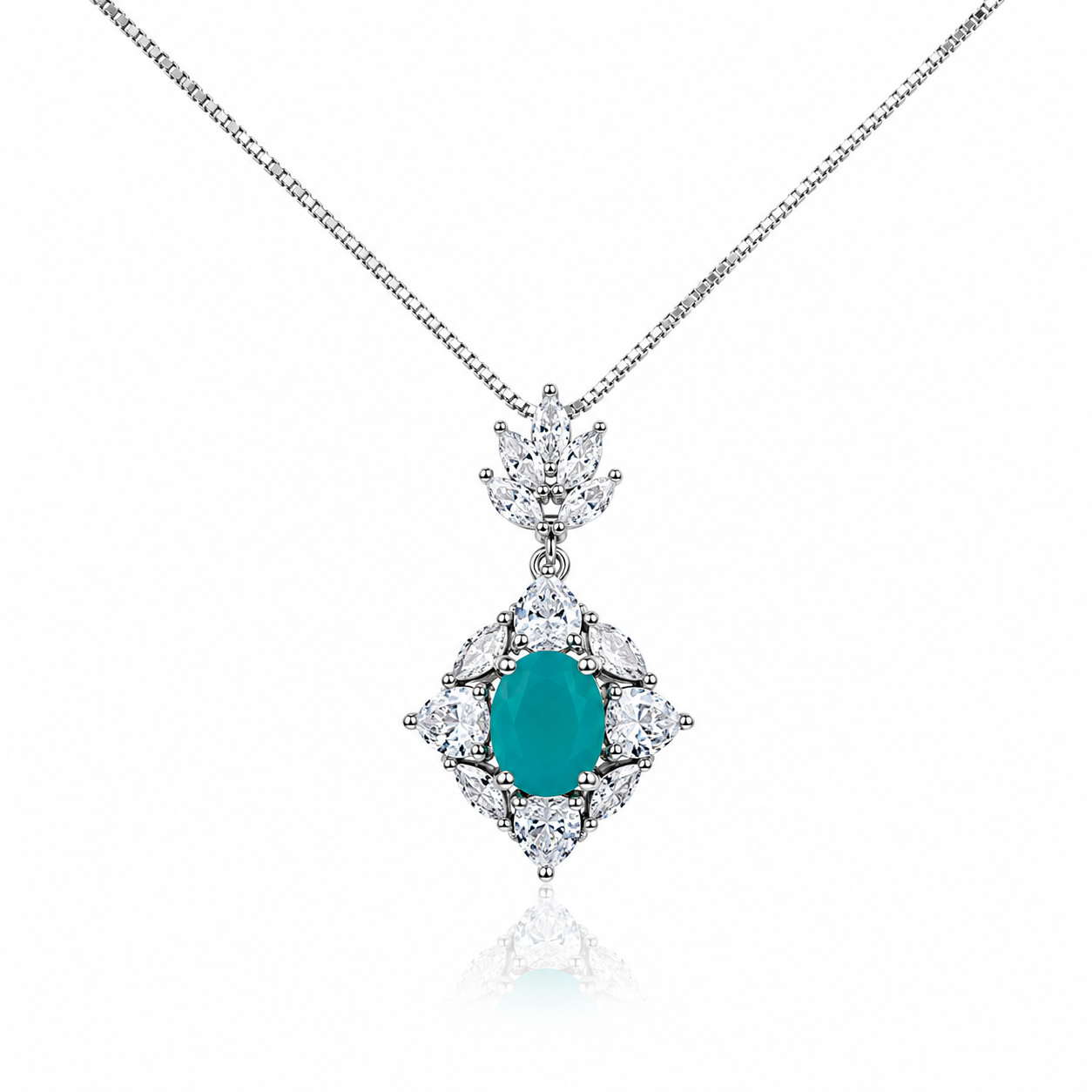 Silver pendant necklace featuring an oval emerald-green crystal surrounded by marquise and pear-cut zircon stones with a floral-inspired design.