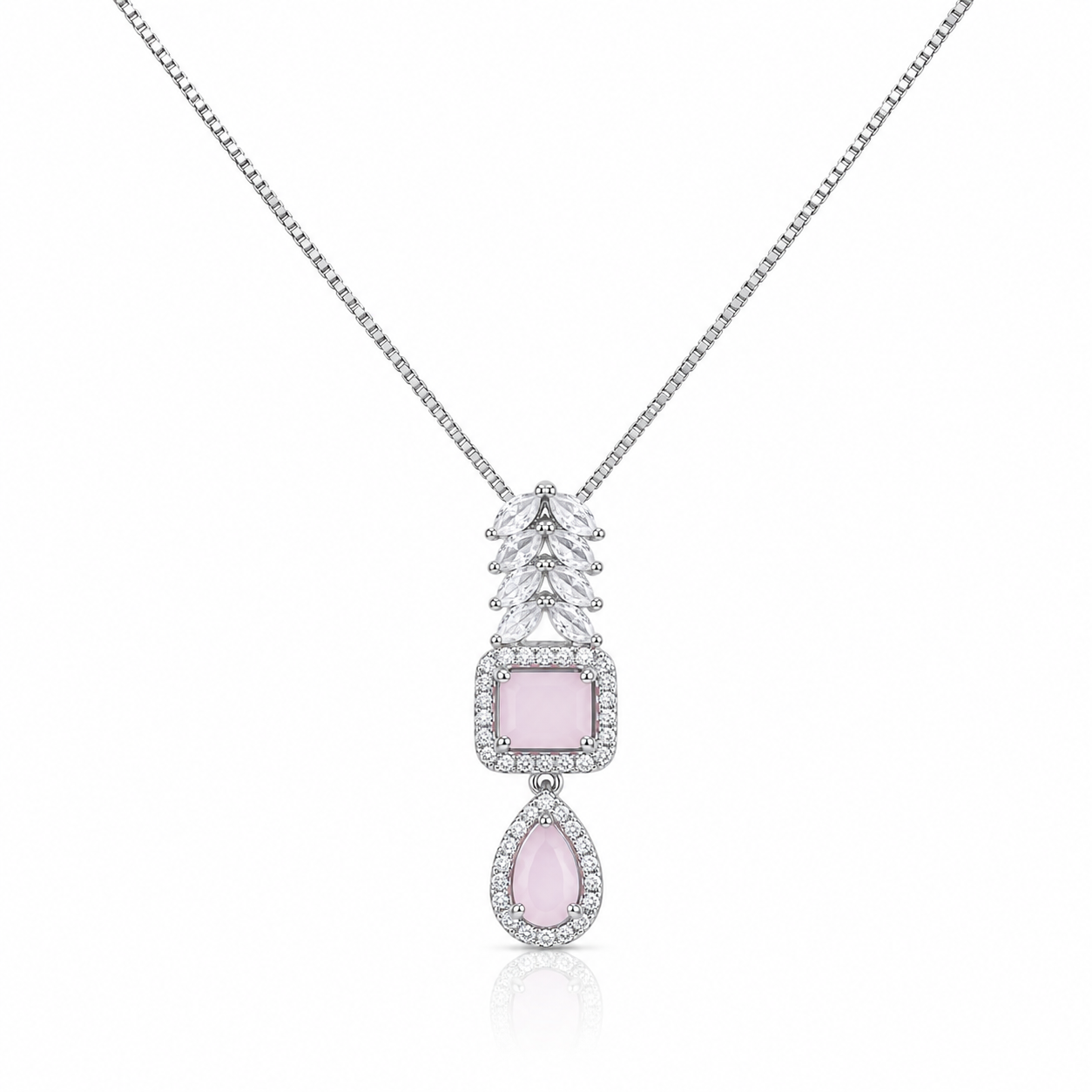 Elegant silver pendant necklace featuring soft pink cushion and teardrop crystals with sparkling zircon detailing.